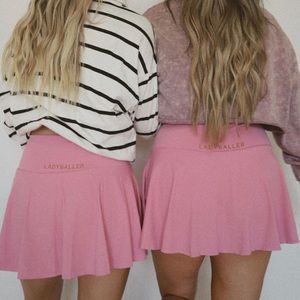 KAXI Co. tennis skirt in pink.